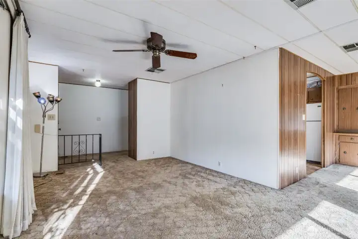 Open living room design offers plenty of space for your favorite furnishings and easy movement throughout.