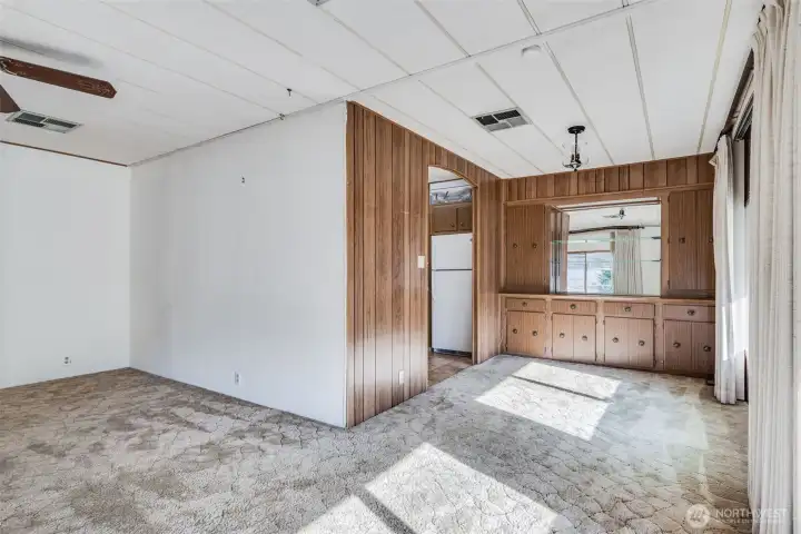 Living and dining areas flow together beautifully, creating a welcoming setting for everyday comfort or entertaining.