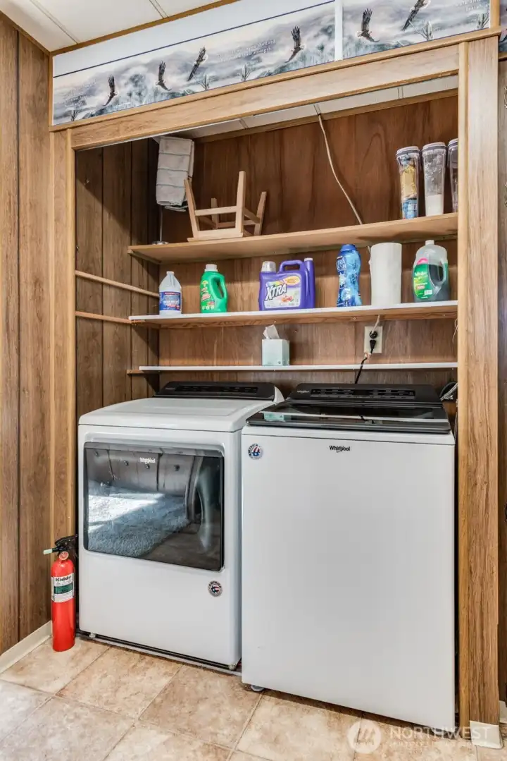 In-home laundry area with washer and dryer included—adding everyday ease and practicality.