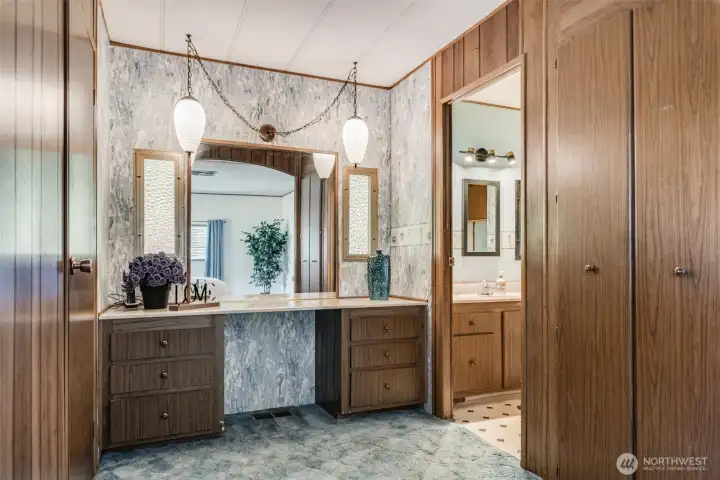 Private ensuite bath with extended vanity and great counter space for daily convenience.