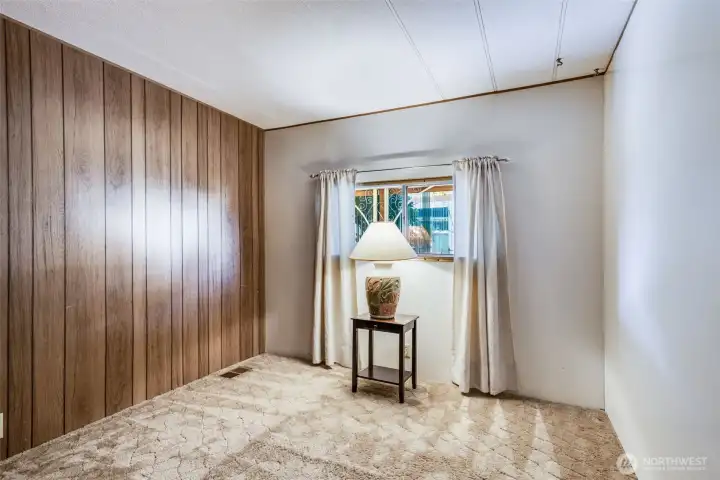 Second bedroom offers cozy comfort and flexibility for guests, crafts, or a quiet reading nook.