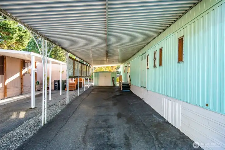 Extra-long covered driveway provides ample parking for up to three vehicles with easy access to the home.