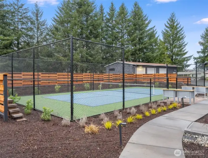 Stay active and social with a match on the brand-new pickleball court, surrounded by lush landscaping and nearby.