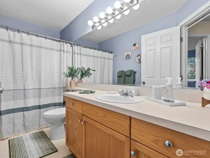 A full bathroom completes the upstairs level.
