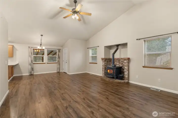 Pellet stove with open dining room and kitchen