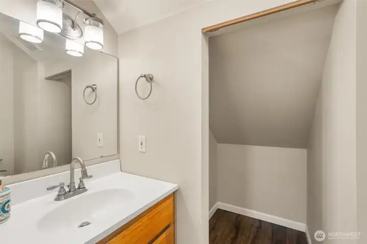 1/2 bath with lots of storage off laundry room