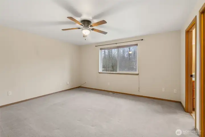 Primary bedroom with large walk in closet and ensuite