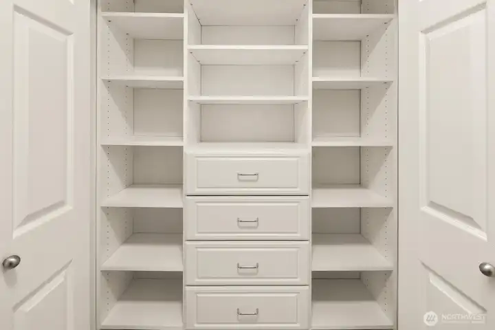 Custom closet by Closet by Design in primary bedroom