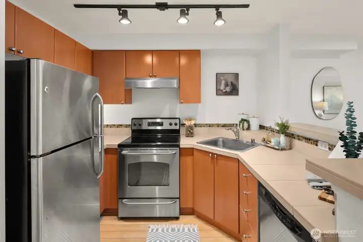 Open-Concept kitchen with GE stainless appliances