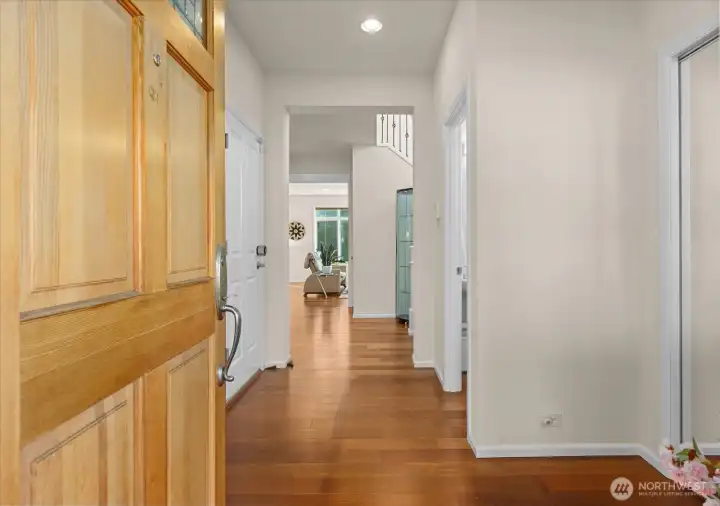 Beautiful hardwoods greet you upon entry