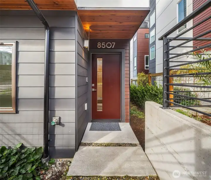 Covered porch leading to front door.