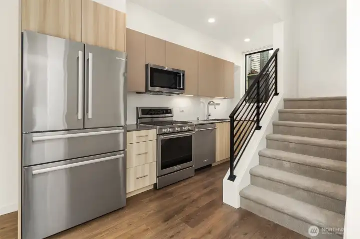 Kitchen with stainless steel appliances.