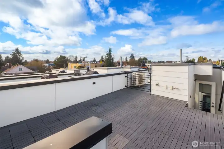 Rooftop deck with gas line + water line + electrical outlet.