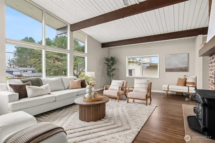 What a great spot to entertain - room for a crowd, made warm and cozy by the floor to ceiling fireplace - and don't forget those mountain and capitol dome views.