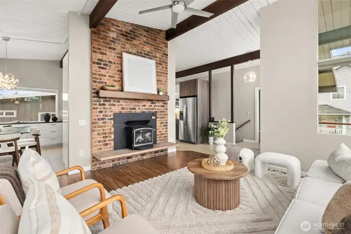 Guests won't want to leave this space! Don't miss the antique collectible Fisher wood burning insert! The orig chimney has been completely rebuilt and new stainless liner meets code; ceiling fan helps circulate the cozy heat throughout the main level. (Don't worry, home also has gas forced air heat if that's your preference.)
