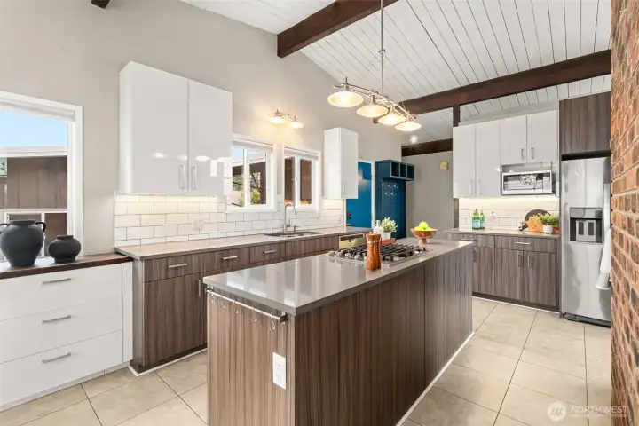 Don't miss the gourmet gas rangetop - 2 yrs new! Turquoise door at left leads to the rear yard, just beyond is a gorgeous built-in hall tree.