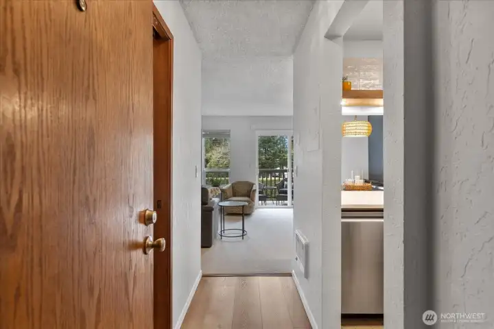 Welcome Home, Kitchen to the right, 1/2 bath to the left and living/dining area straight ahead.