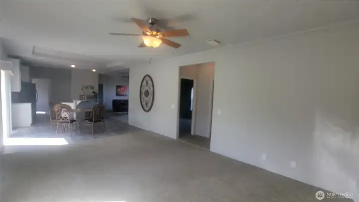 Back of family room next to storage room looking toward kitchen