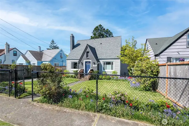 Fully fenced. Front is black chain link with an electric-motarized rolling gate with remote controls for your vehicles.