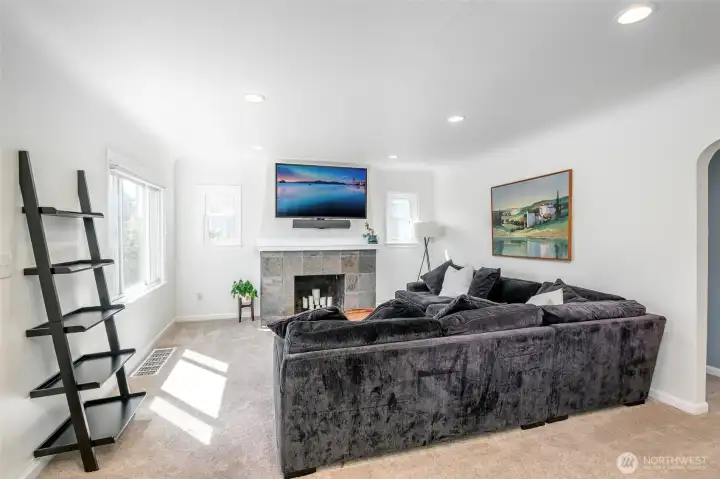 Awesome - Roomy - Living Room.  Telescoping TV wall mount conveys.  This wall mount is not your ordinary mount!  Wiring is tunnellled into the wall to eliminate visibility of your A/V wiring.