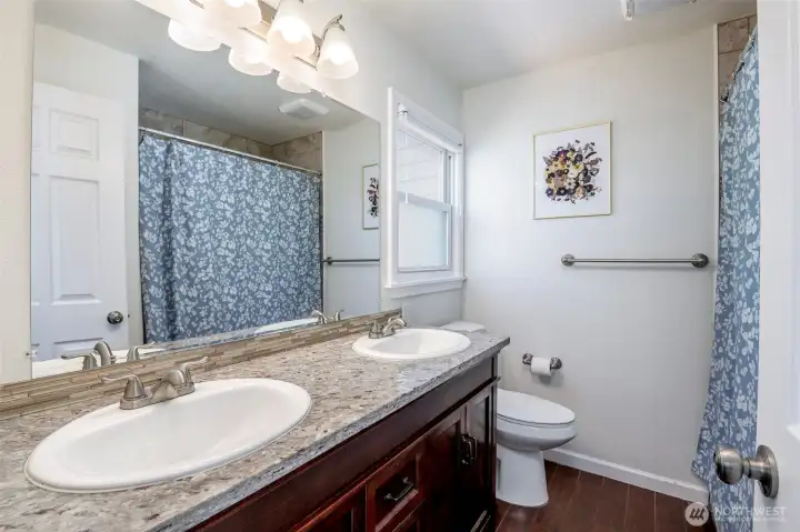 This full bathroom is completely private to your primary bedroom.  Double Vanity + Bath & Shower for your private SPA & Calm Space :-)