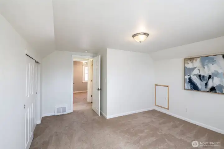 Large upper bedroom with common bath/shower just a step away.