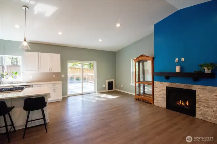 Original space showing dining room area and dog door.