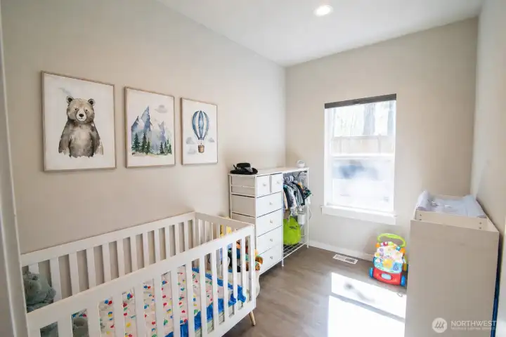 Office space next to primary bedroom, or perhaps a nursery (as the seller's are using it for).