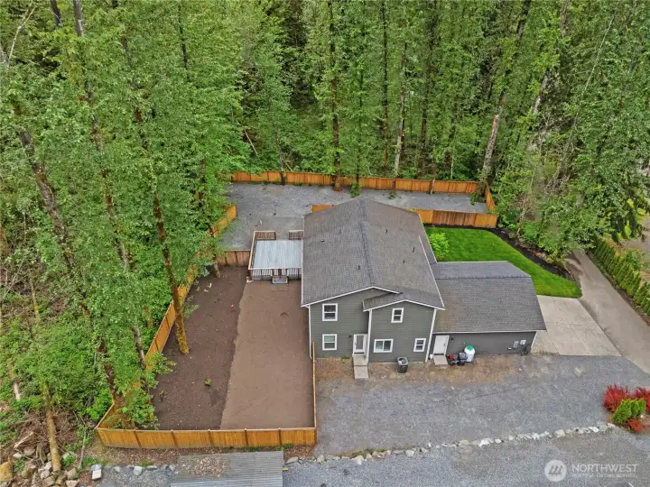 Back yard with fresh mulch, soil and natural landscaping, ready to make your dream yard come true! Along with the 2 car garage, there is so much room for additional cars, an RV, ATV, Boat, toys or a storage shed. Back yard with fresh mulch, soil and natural landscaping, ready to make your dream yard come true! Along with the 2 car garage, there is so much room for additional cars, an RV, ATV, Boat, toys or a storage shed.