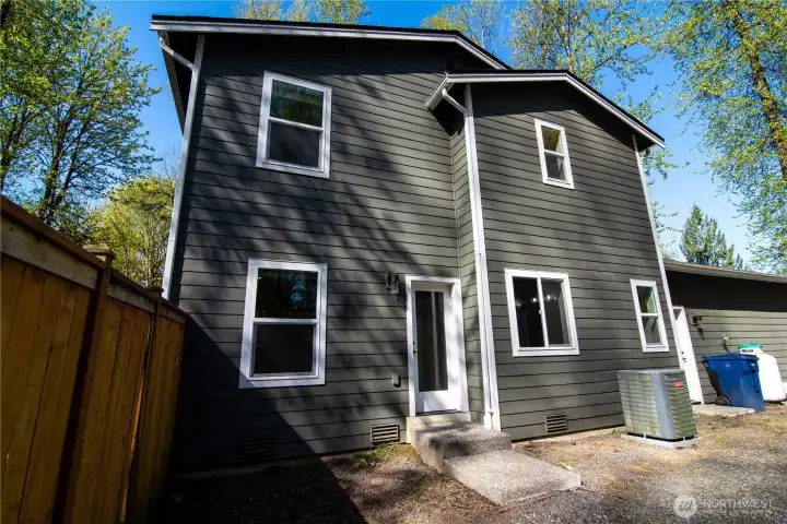 Side yard showing private entrance to primary bedroom. Side yard showing private entrance to primary bedroom.
