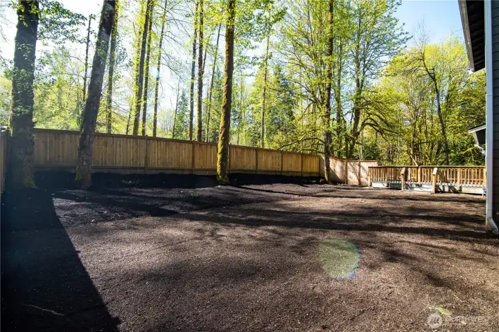 The actual property lines extend beyond the fencing, so you could add a gate out to the rest of your property, but this allows room for pets, a playset, a garden or anything your heart desires!