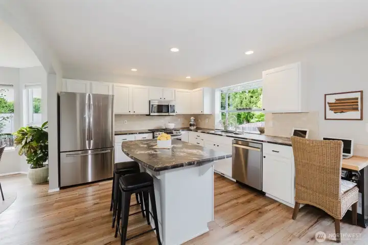 Leathered granite island with seating