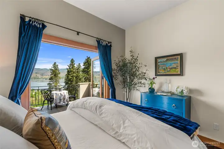 Relaxing guest retreat with French doors opening to a private view balcony
