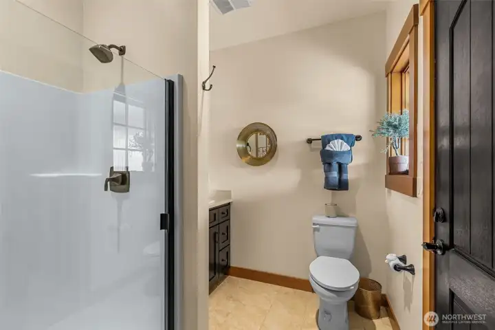Poolside convenience meets stylish design in this 3/4 bath thoughtfully accessed from the covered patio