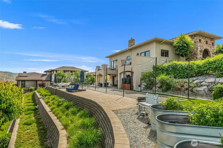 From the pool terrace to the terraced gardens, every outdoor space is designed to capture the beauty of the setting