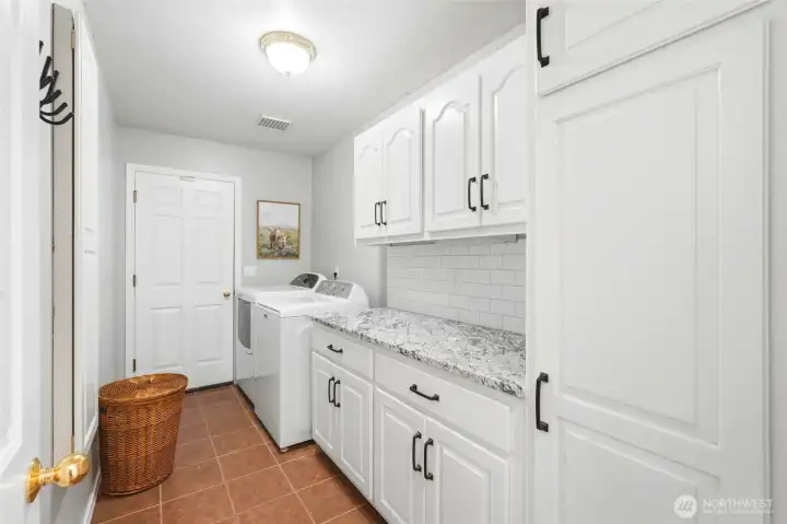 Laundry room w/ lots of storage! Laundry room w/ lots of storage!