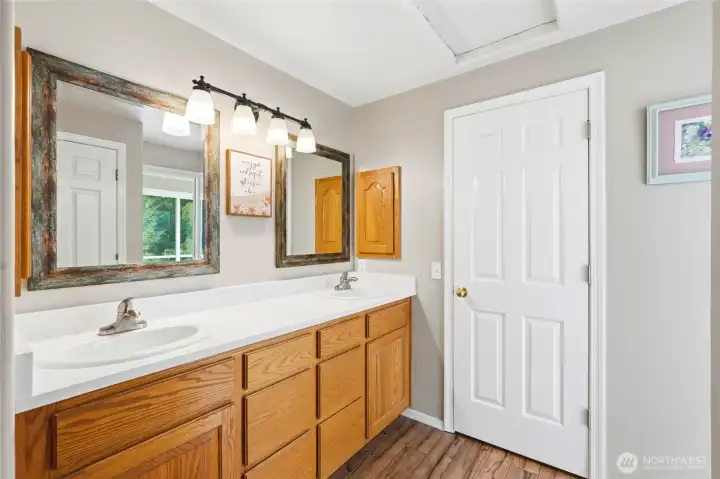 Bathroom off of primary and walk in closet Bathroom off of primary and walk in closet