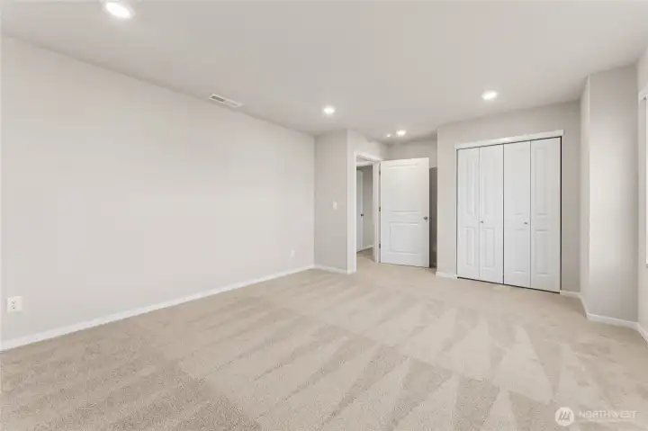 Movie room or large secondary bedroom.
