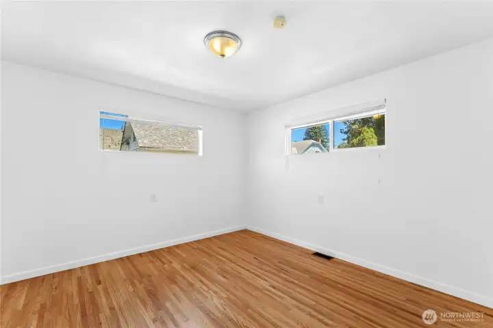 2nd bedroom also features restored original hardwood floors. 2nd bedroom also features restored original hardwood floors.