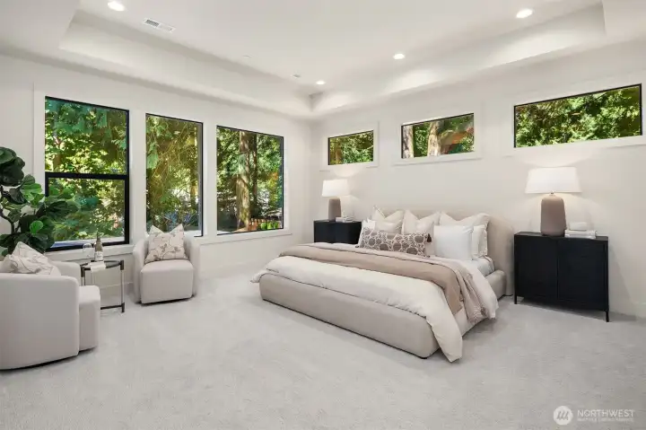 Designer primary suite with five-piece bath & heated floors