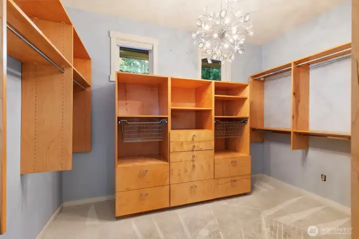 One of two primary walk in closets