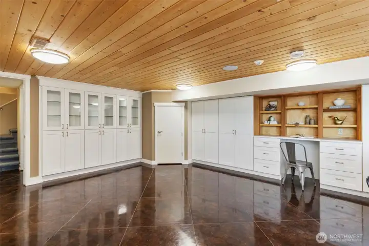 Desk space and storage and laundry in basement area