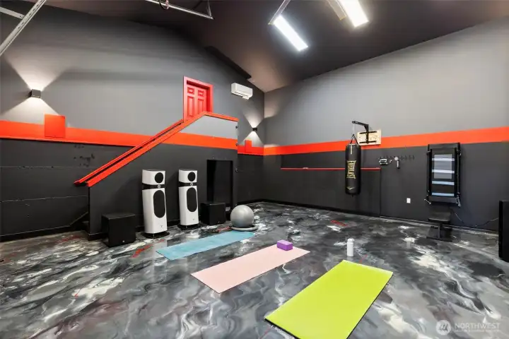 Climate controlled Workout room/media room/shop space!