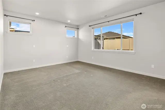 A thoughtfully designed layout allows for a cozy yet open feel, accommodating a king-sized bed with ease while still offering room for a seating area or additional furnishings
