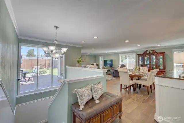 Once you enter the home, the dining and living areas are straight ahead.