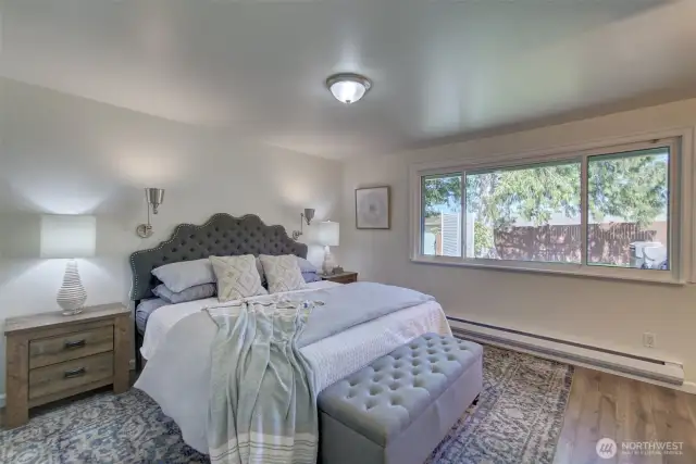 The primary bedroom is located on the main floor. The window faces North, and you have a beautiful view of your back yard.