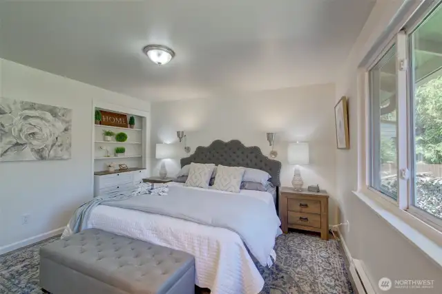 The primary bedroom and adjacent bath were freshly painted.