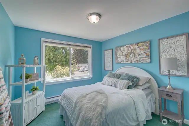 Guest bedroom 2. Located main floor with South facing window.