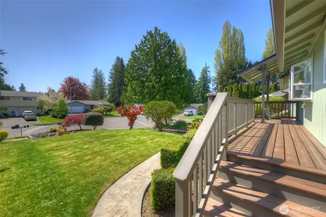 This view is taken on the East side of the front porch showing the large front yard and quiet Cul-du-sac.