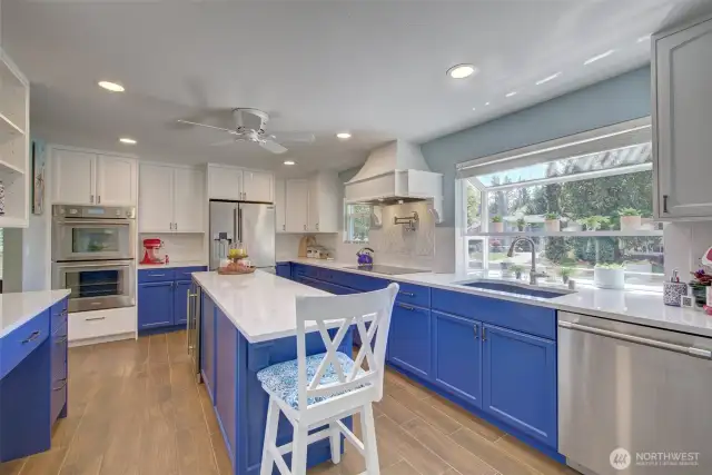 Great counterspace! Kitchen windows face South.
